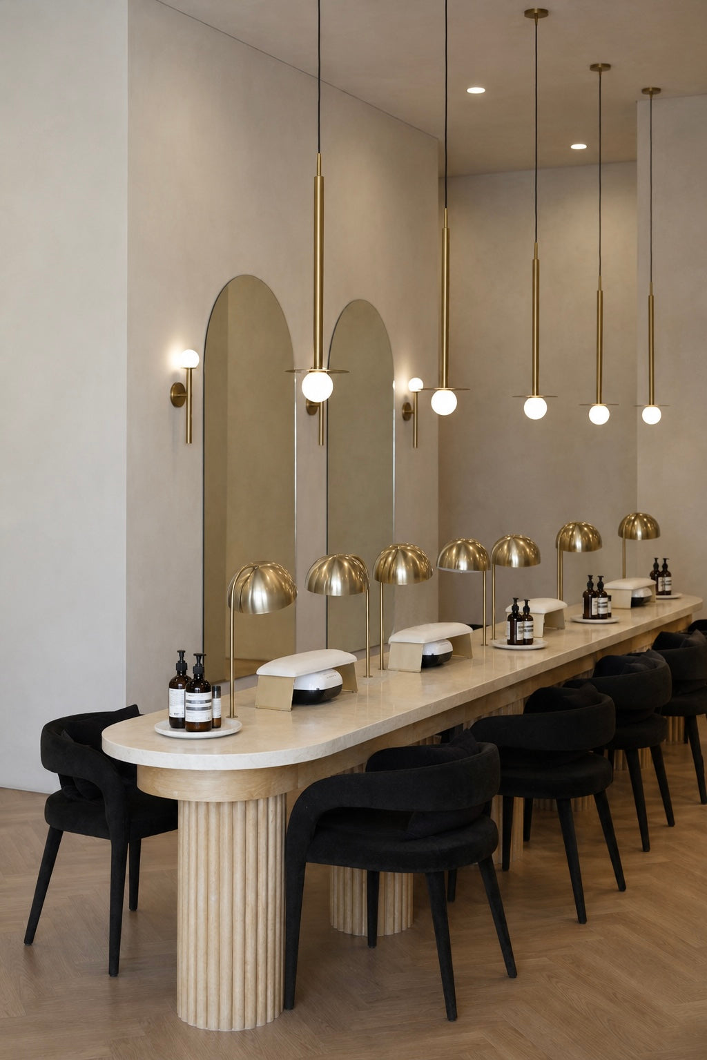 Modern manicure stations inside All Six salon